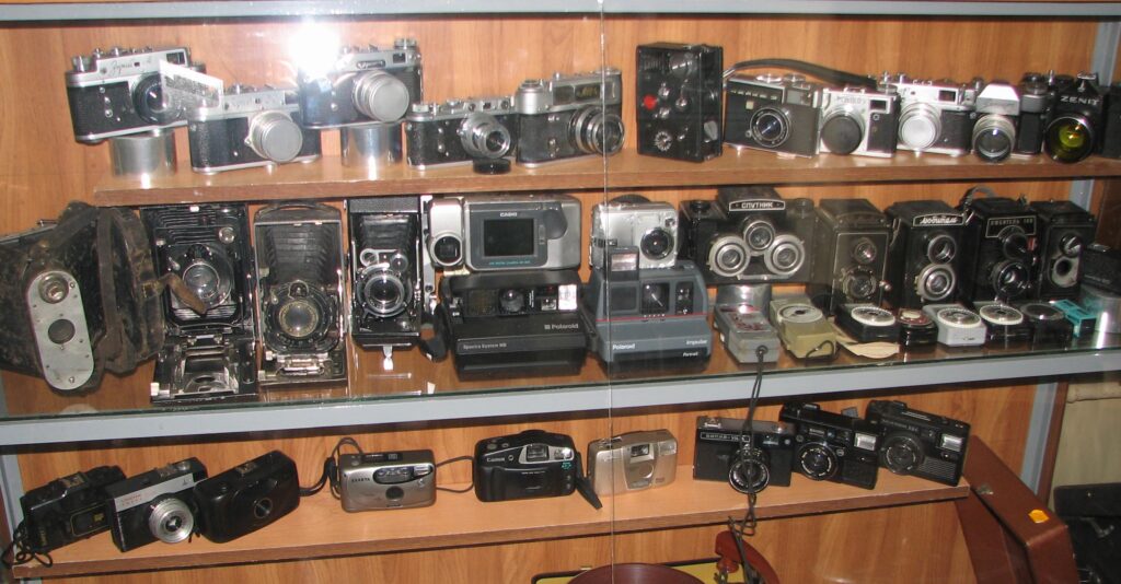 Годинники, фотоапарати, оптичні прилади - Зображення №3